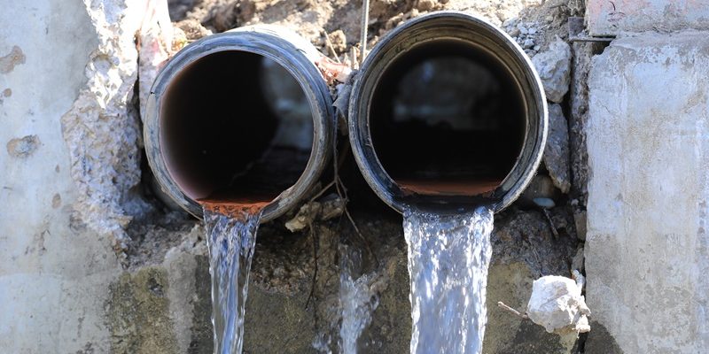 dirty-water-flows-from-two-pipes